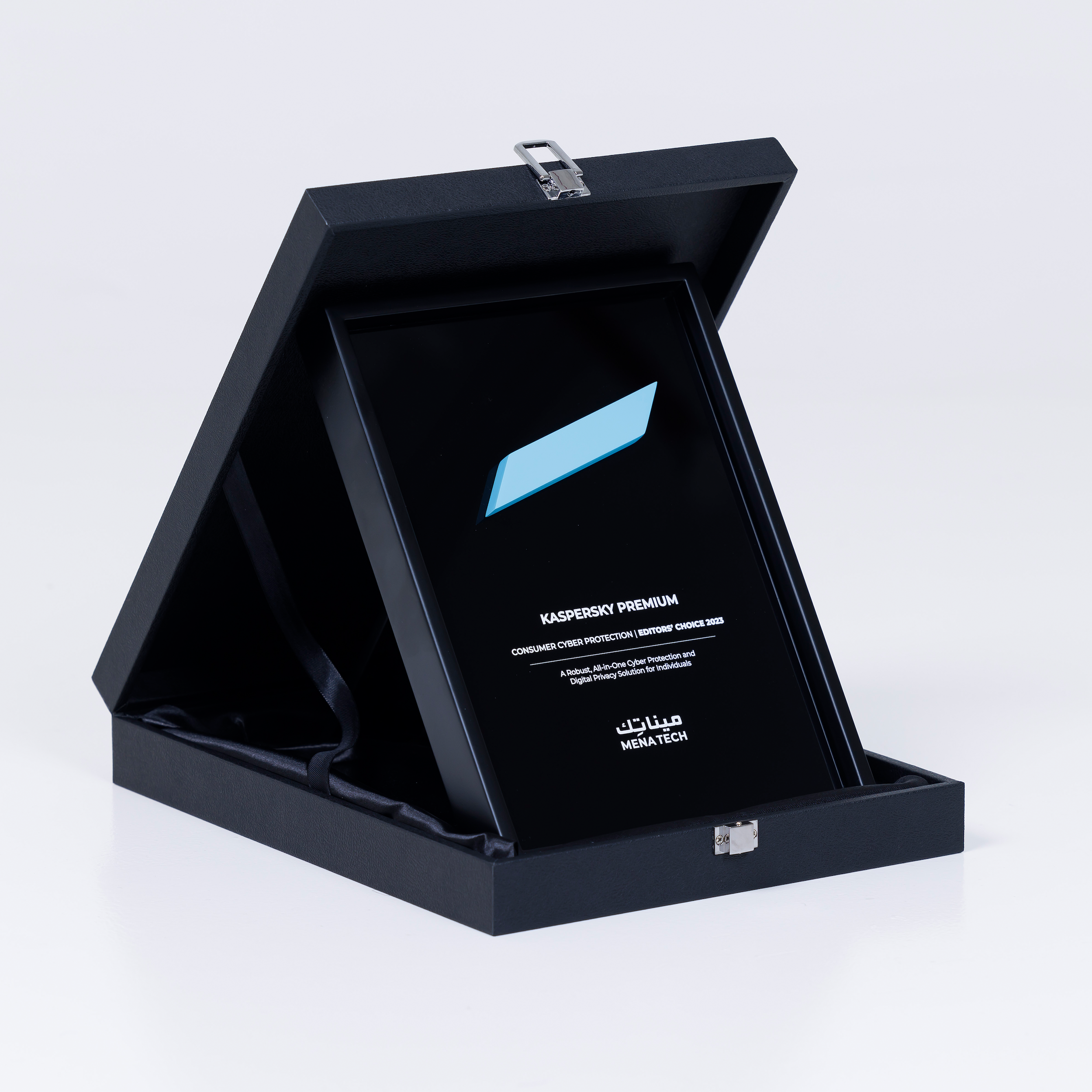 Angled view of the Kaspersky Premium Editors' Choice 2025 award plaque displayed in its presentation box, highlighting the design and engraving