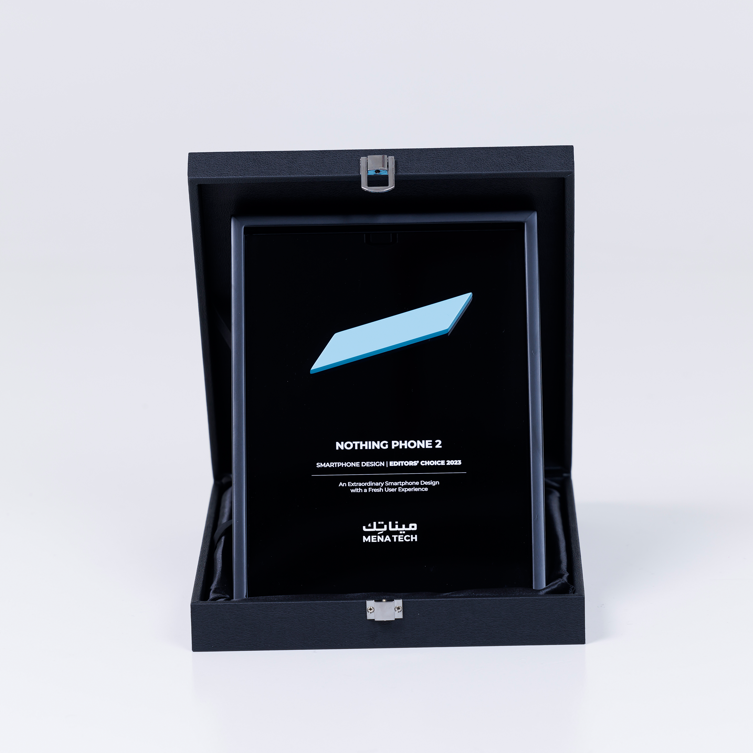 A close-up of the MENA Tech Editors' Choice 2023 award plaque for Nothing Phone 2, recognizing its outstanding smartphone design.