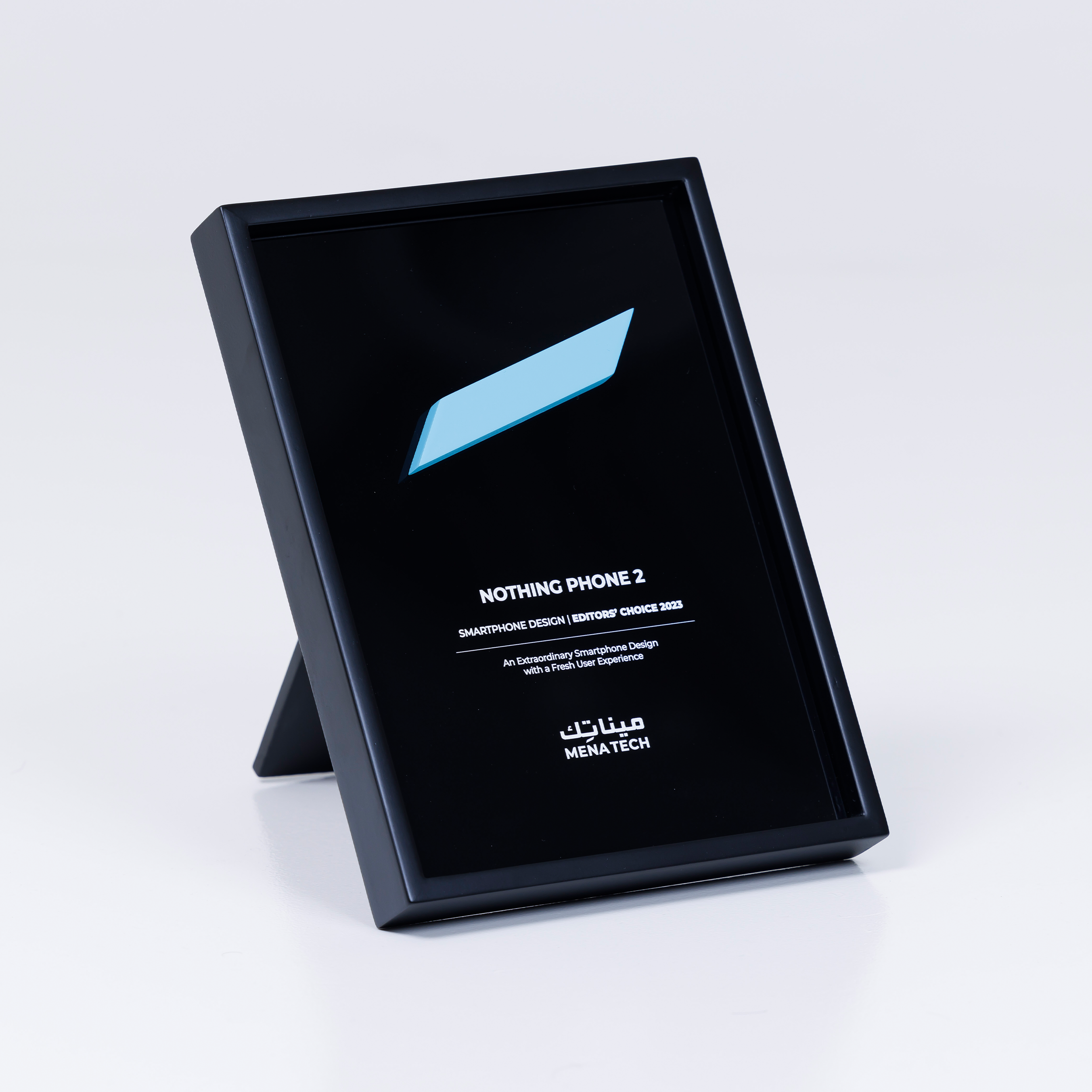 Freestanding view of the Nothing Phone 2 Editors' Choice 2023 award plaque by MENA Tech, celebrating smartphone design excellence.